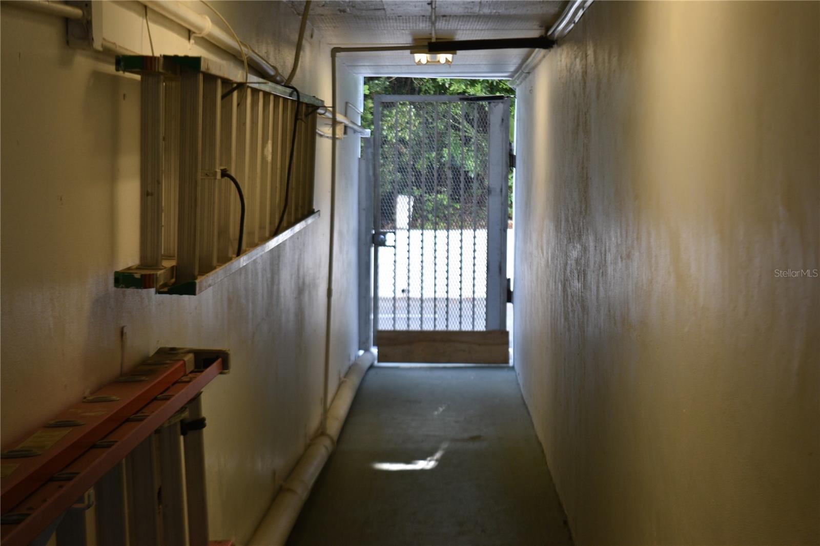 Basement hall to garages in the ally behind building
