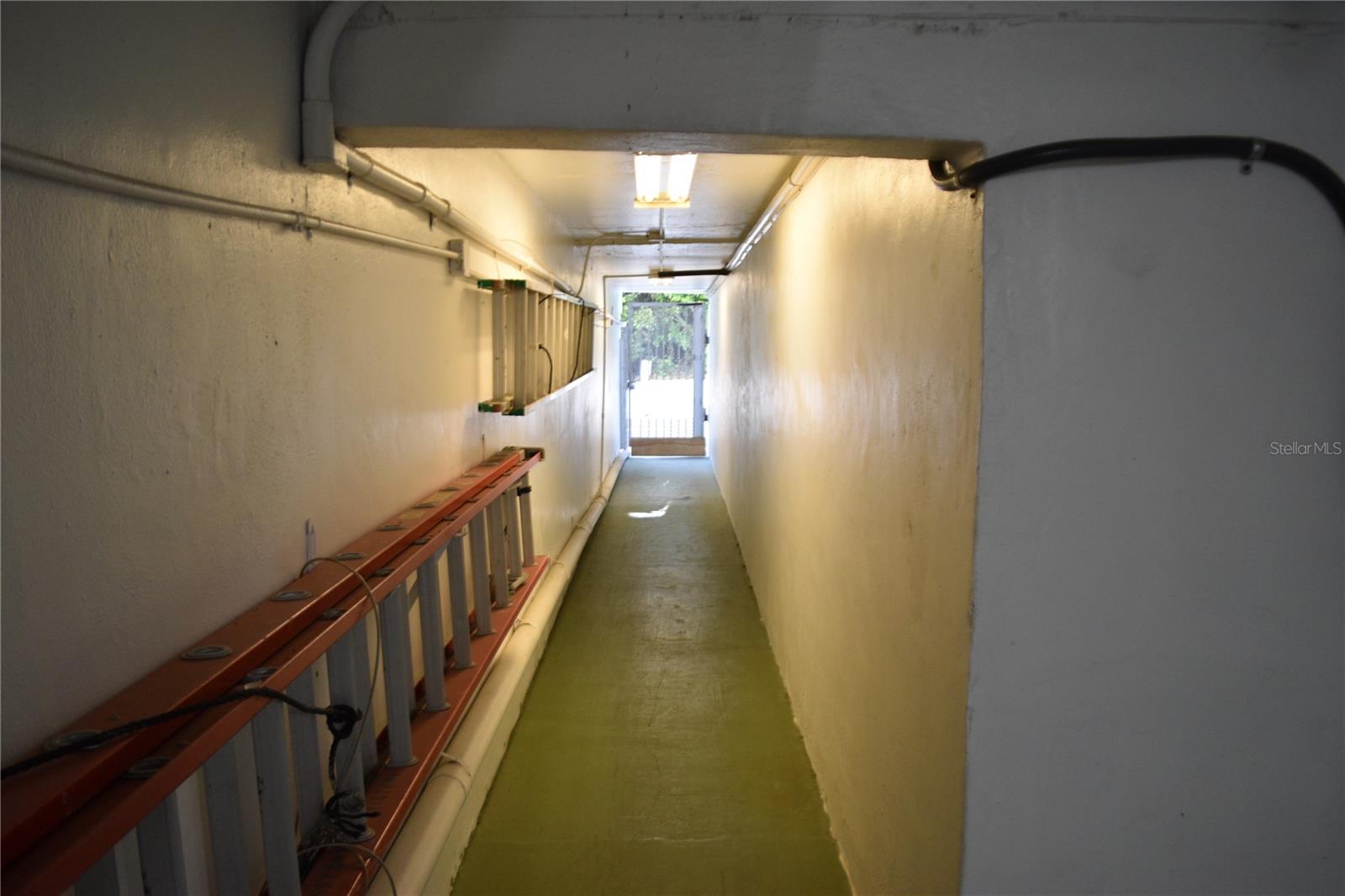 Basement hall to garages in the ally behind building