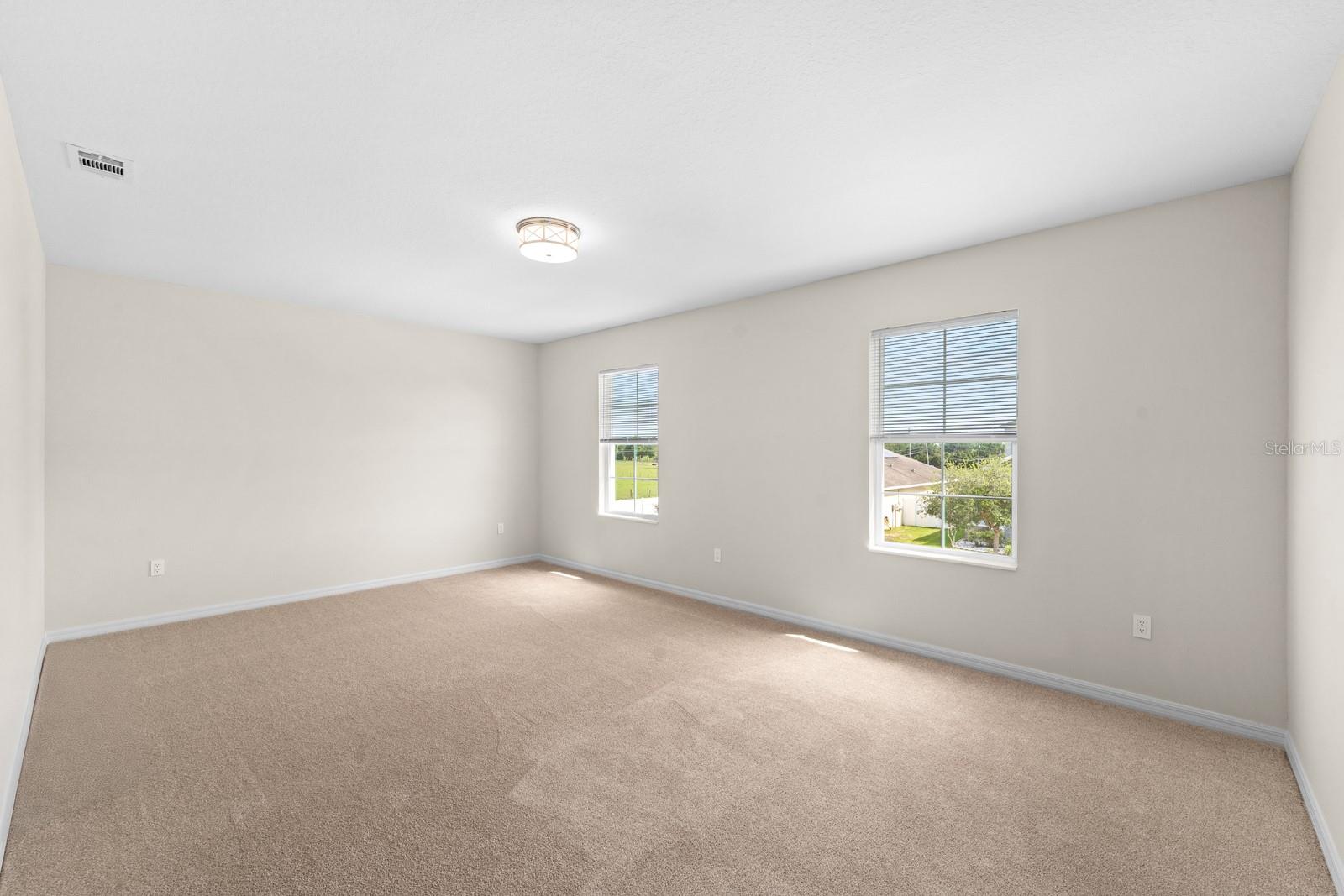 The Primary Bedroom is upstairs.  New carpet was installed on April 7 in the entire upstairs.