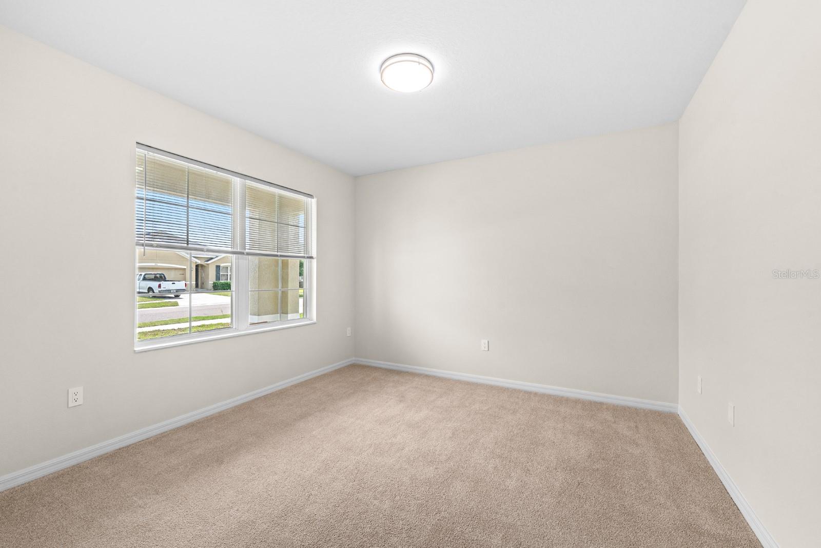 The downstairs bonus room would be an ideal office or playroom, or it could be a 5th bedroom.