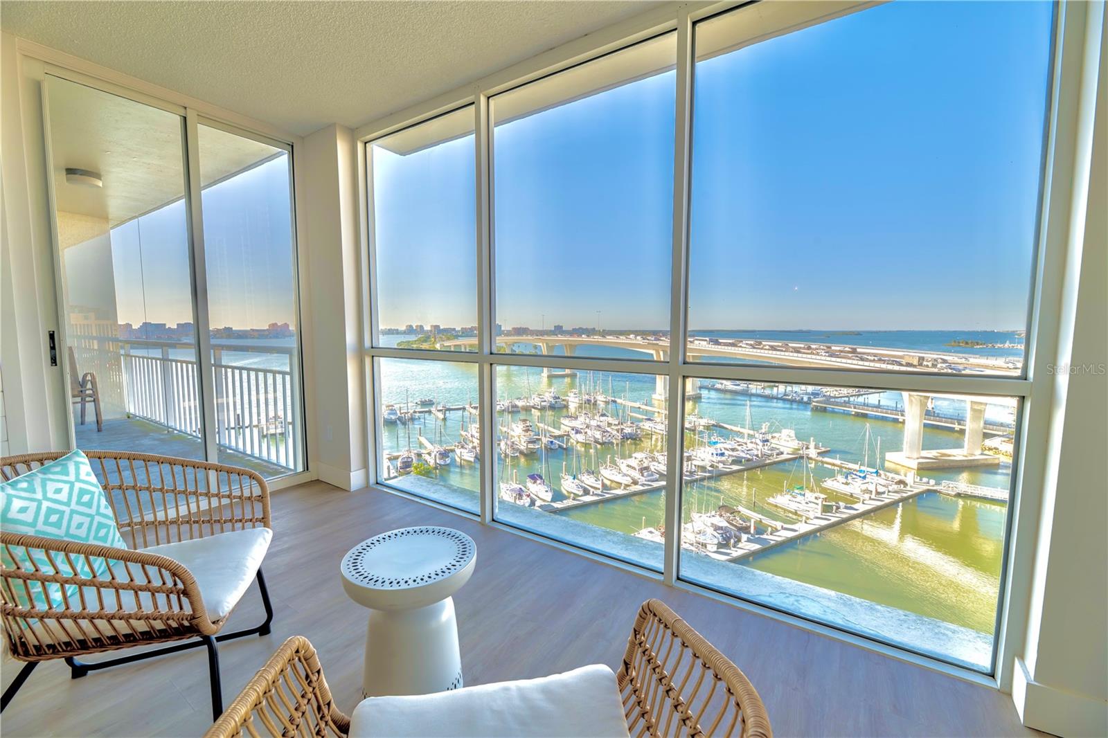 Floor-To-Ceiling Windows looking into Primary Bedroom Balcony