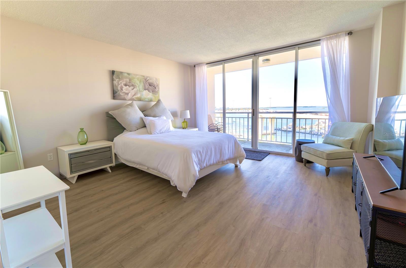 Primary Bedroom & Balcony from door