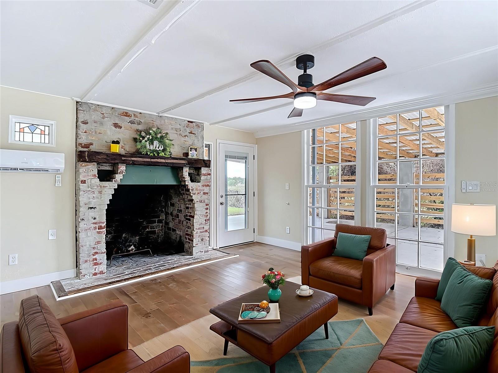 Virtually Staged Sunroom area at front of home