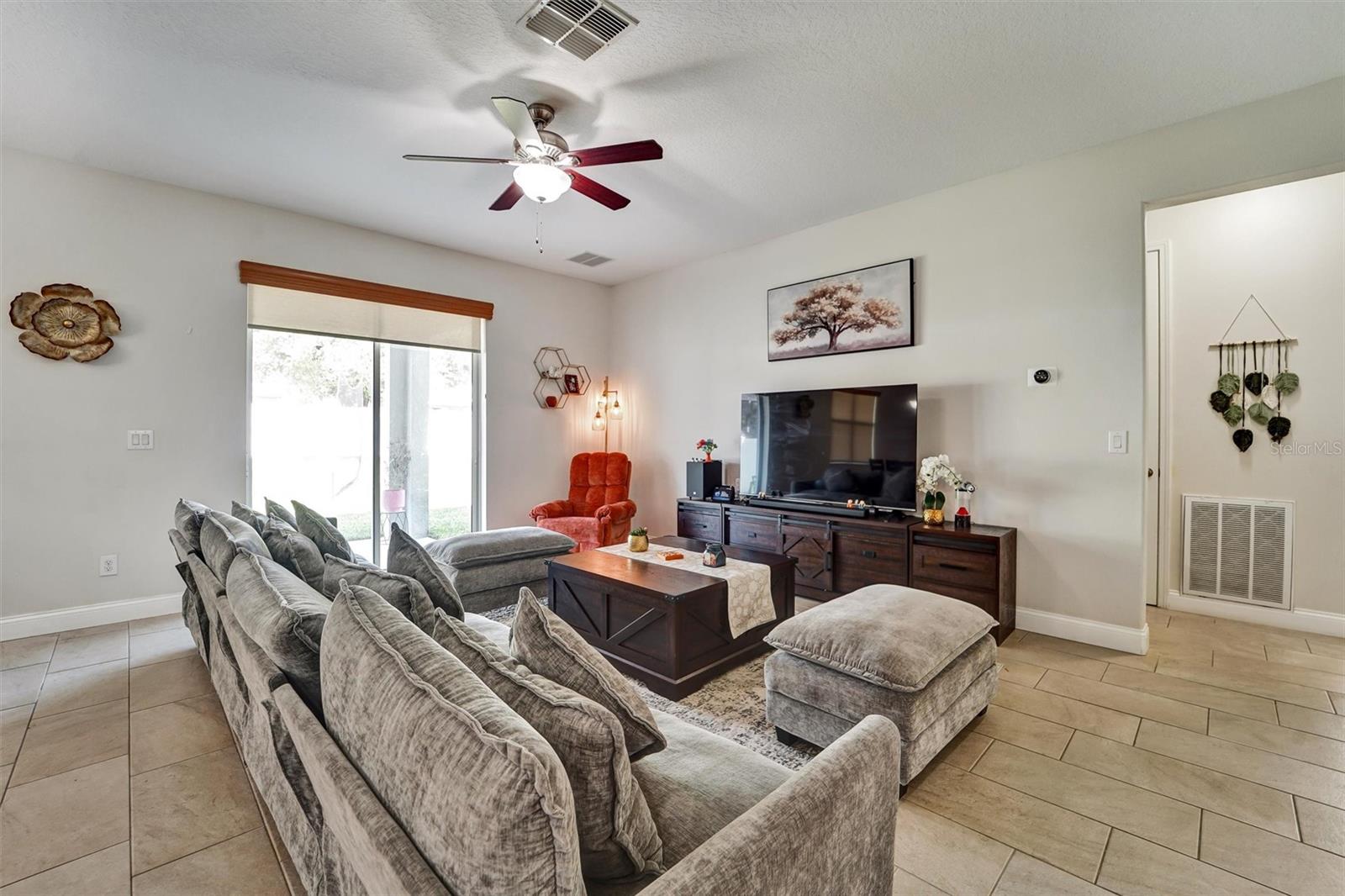 Family room with slider access to spacious back yard