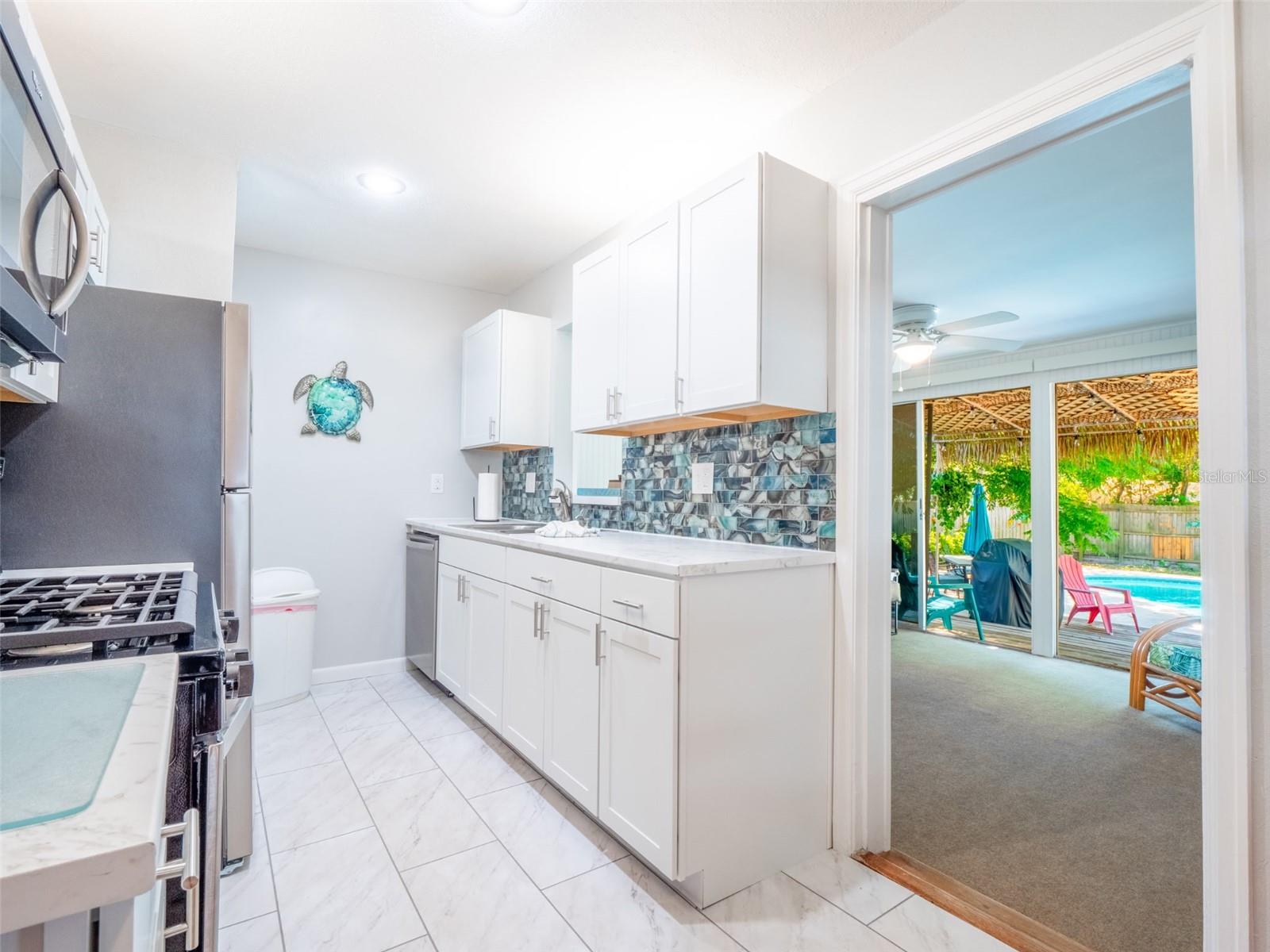 Kitchen with newer appliances and LED can lighting