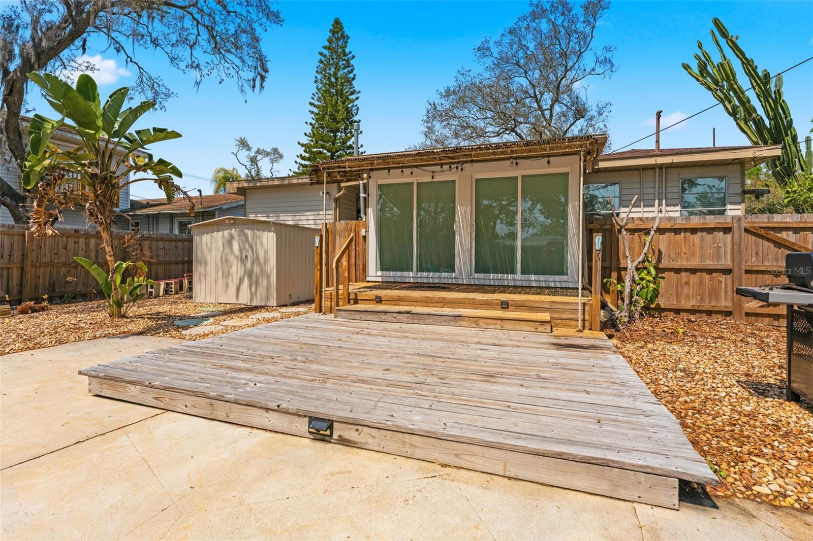 Enjoy both a covered wood deck and and open wood deck