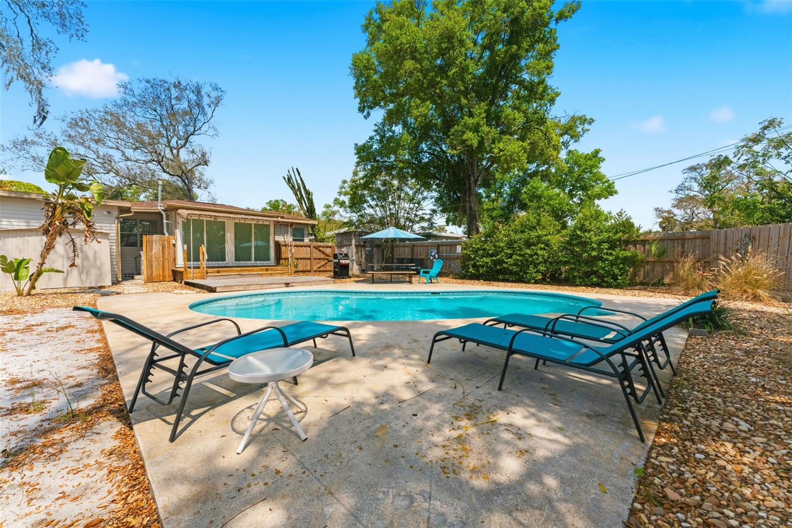 The pool deck offers plenty of space for outdoor furniture