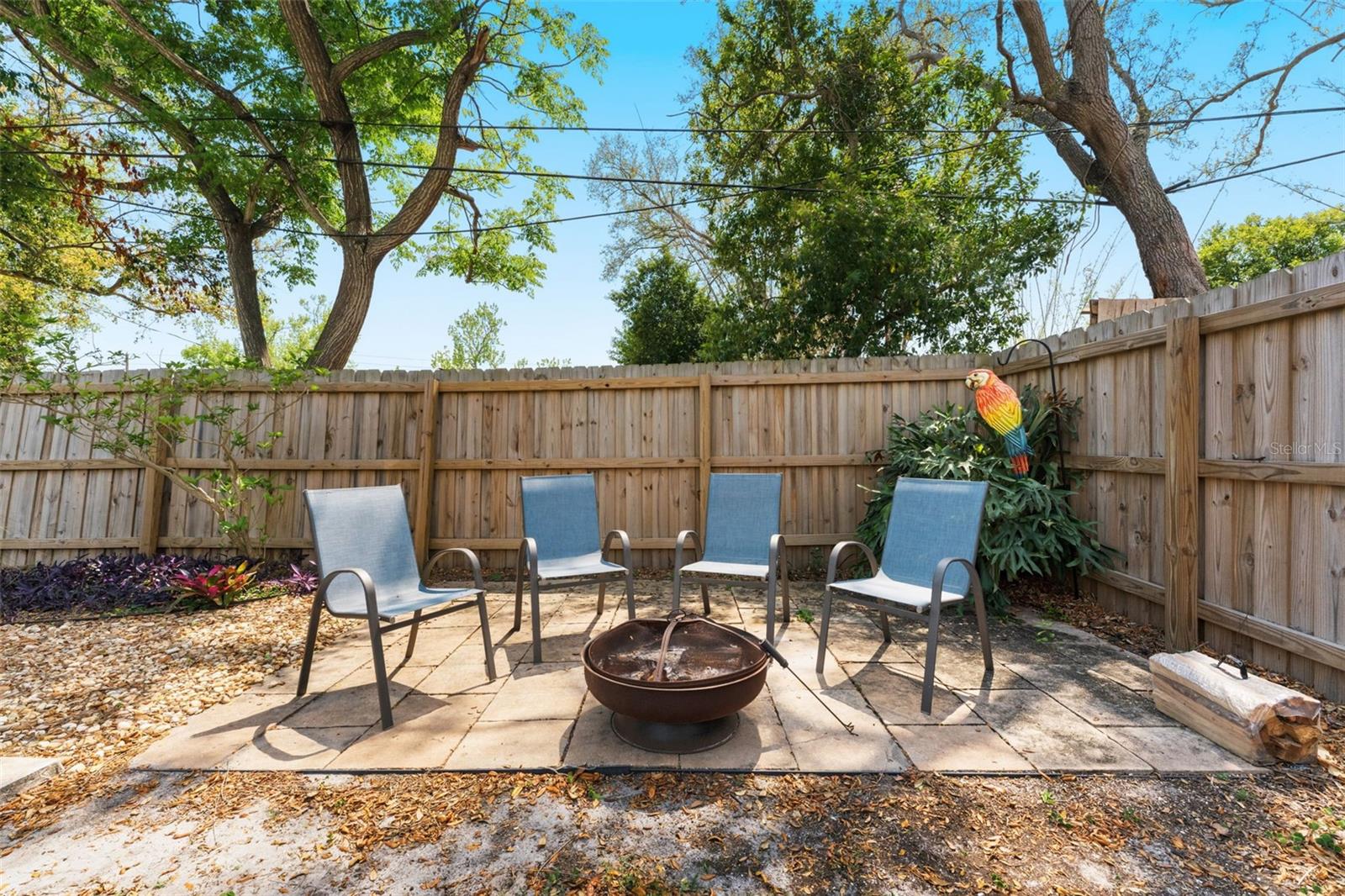 Cozy up with friends and family around your private pavered fire pit—perfect for evenings under the stars.