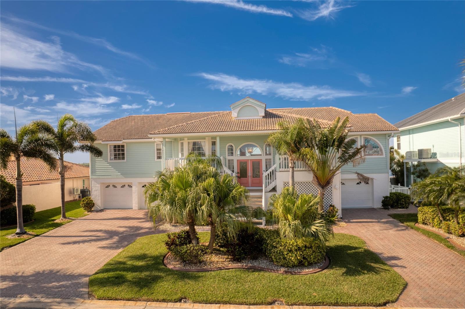 Elevated Gulf-front home in the desirable Gulf Harbors community