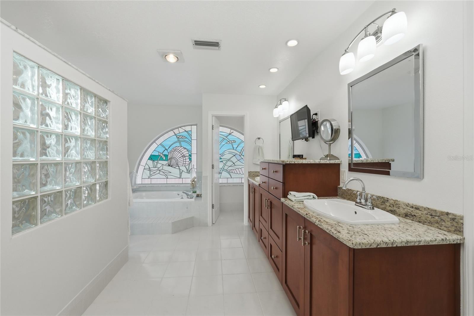 Spacious primary bath offering comfort and functionality
