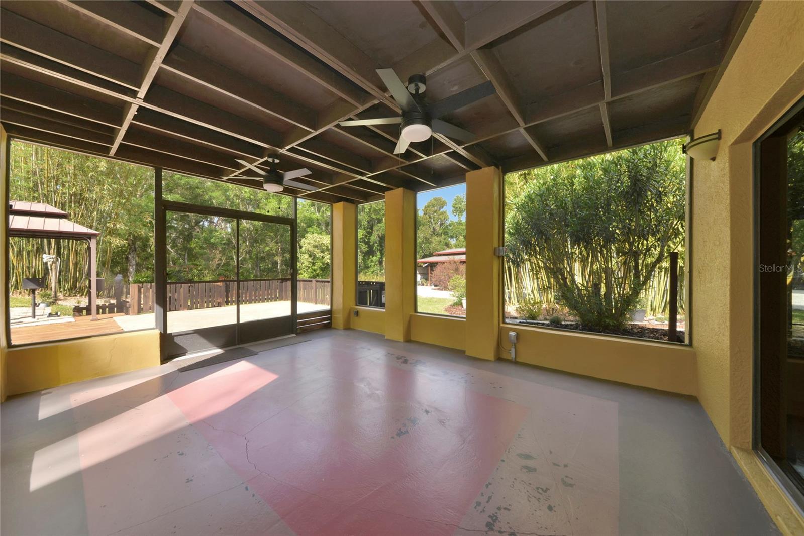 Screened porch with concrete supports