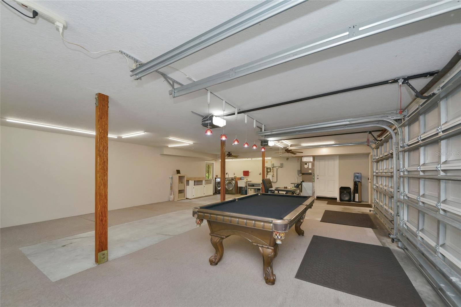 3 car garage that could be enclosed & make an in law suite