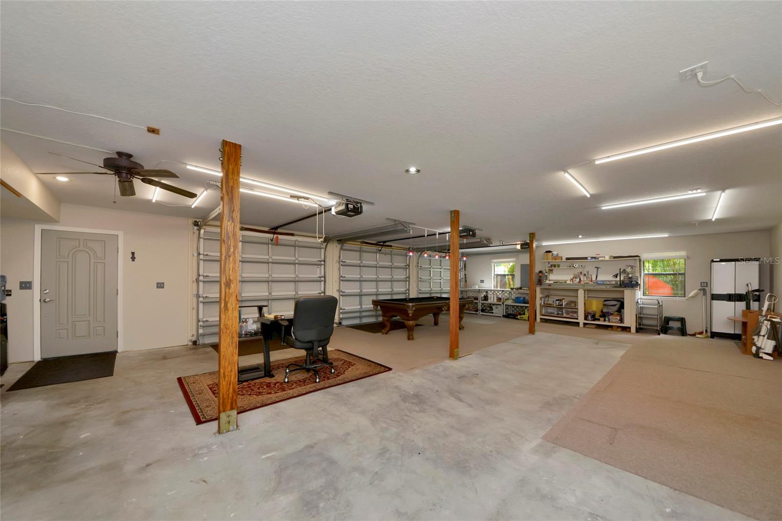 3 car garage with so much potential