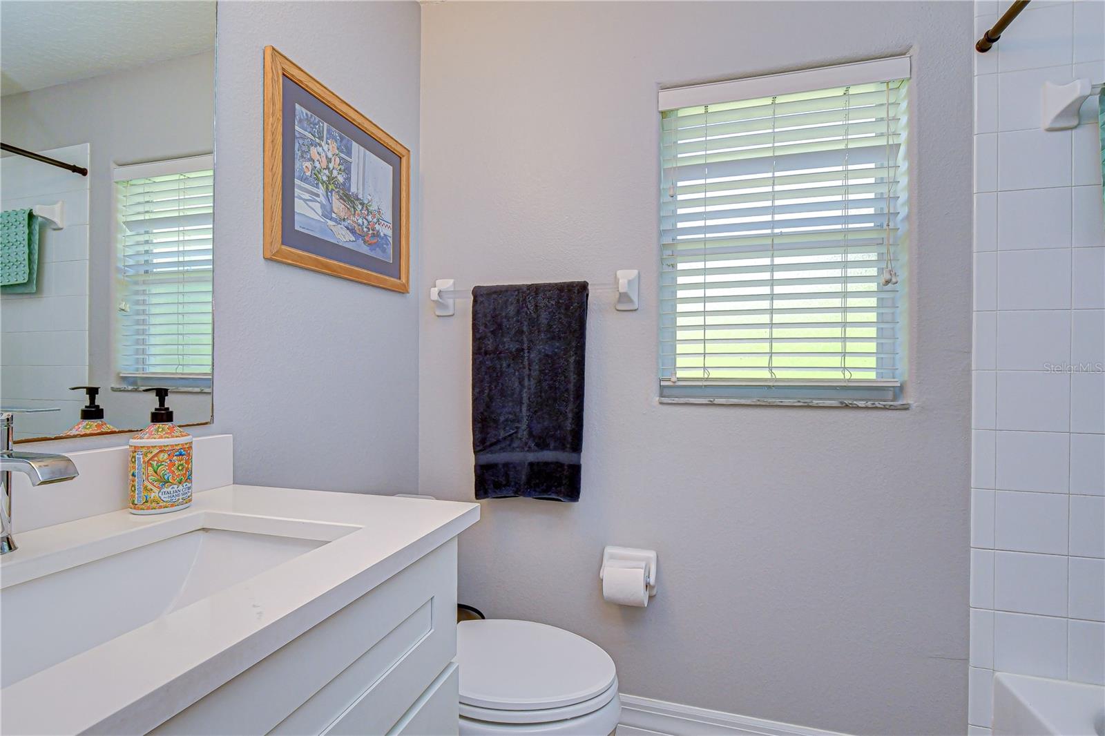 Well-maintained full bath serving secondary bedrooms