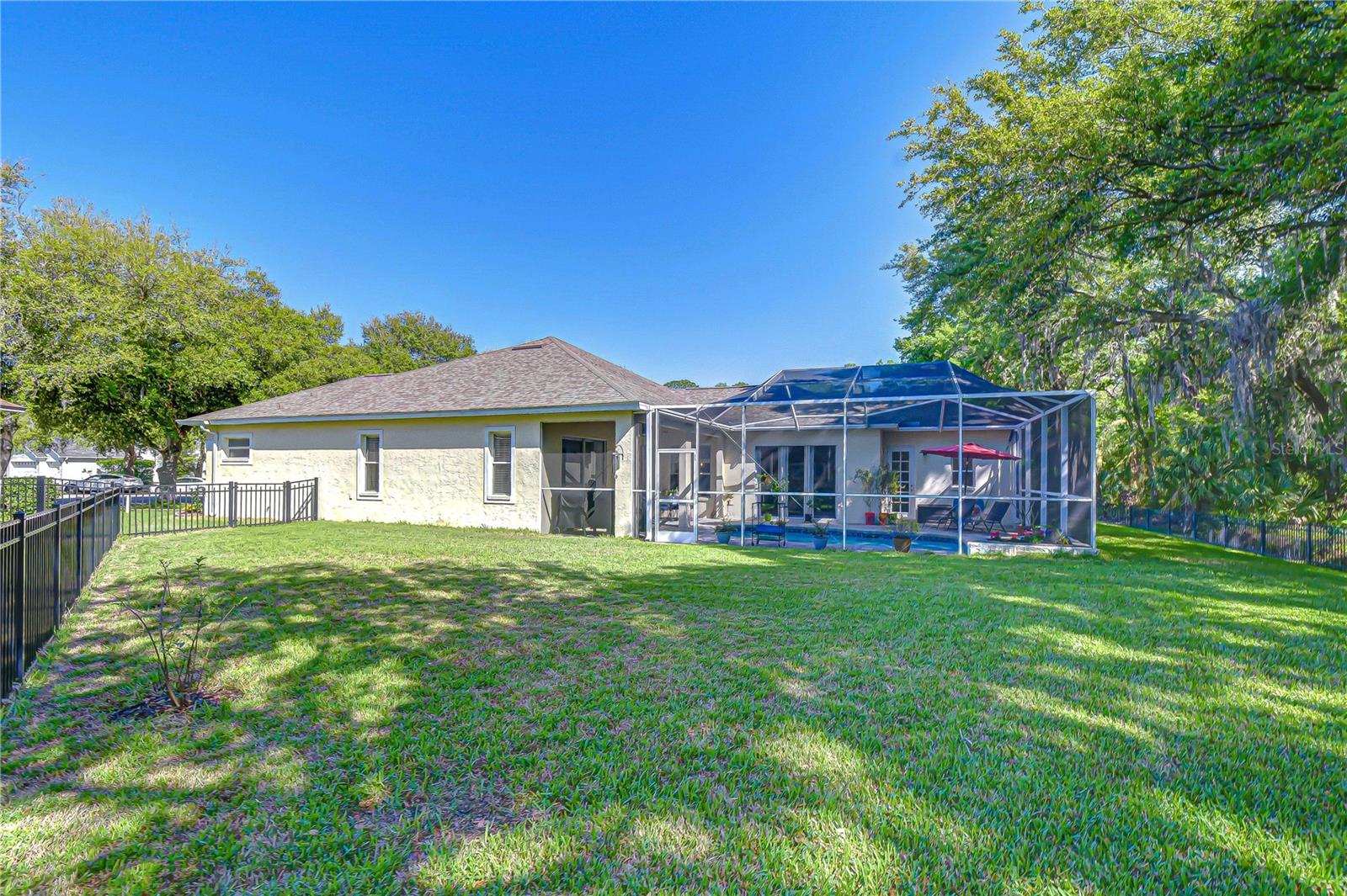 Generous backyard space with room to relax, play, or entertain