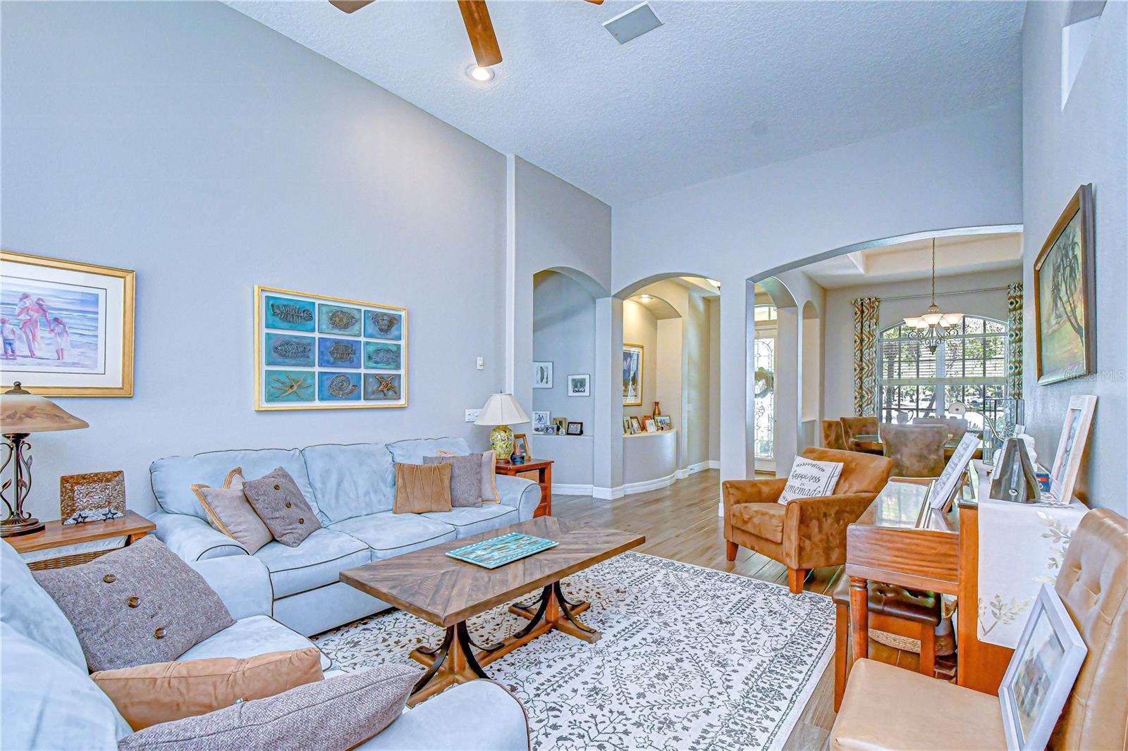 Open-concept layout connecting living, kitchen, and outdoor spaces