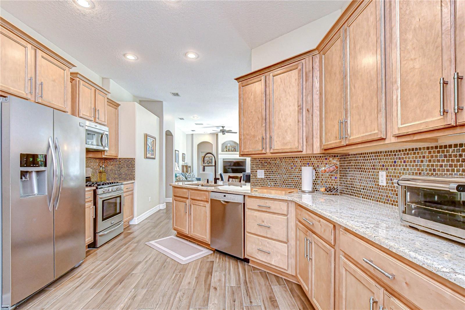 Equipped with stainless steel appliances and abundant storage