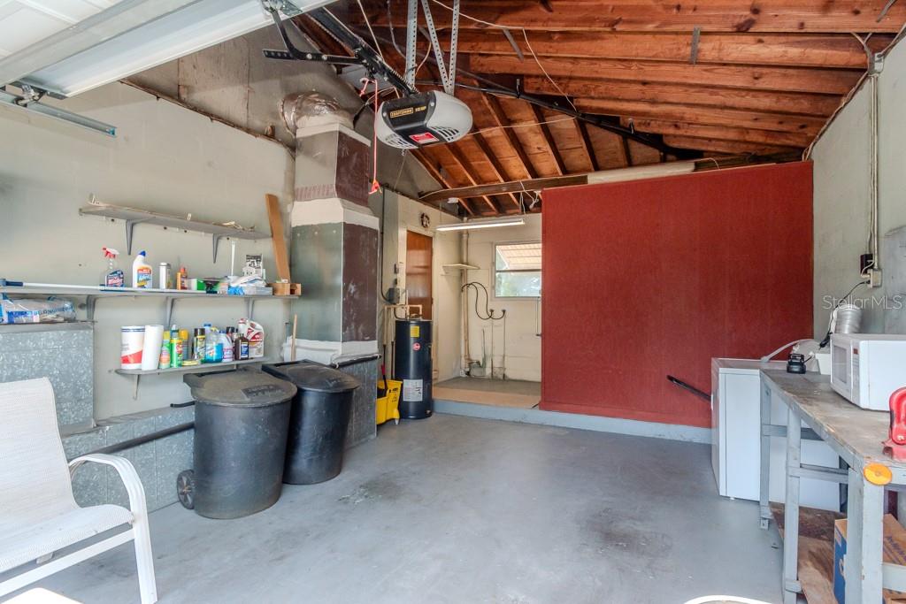 EXTRA LONG GARAGE HAS LOTS OF STORAGE SPACE