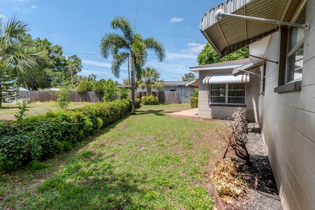 SIDE VIEW OF BACK YARD & HOUSE