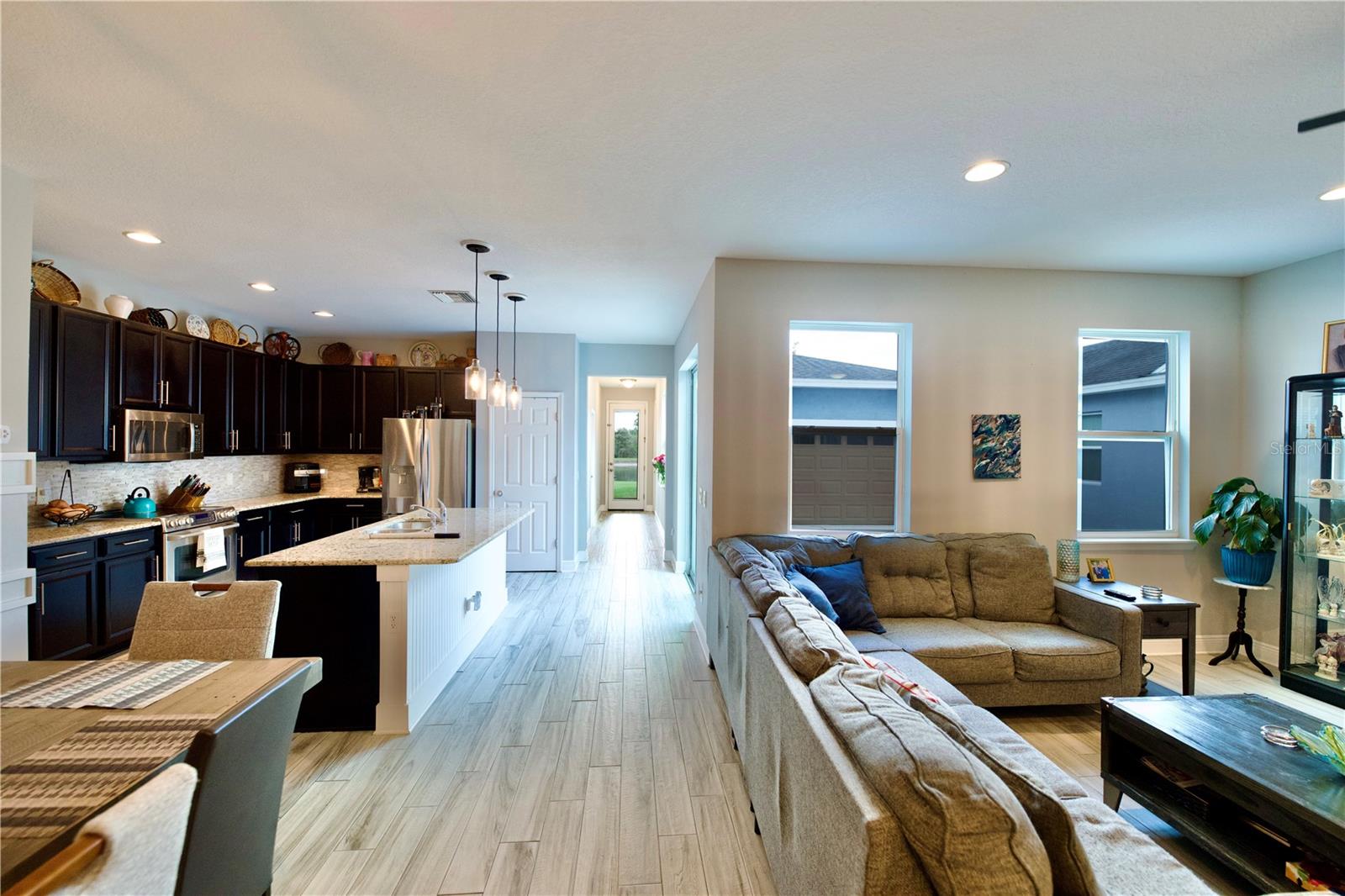 Open view of Kitchen and Living Room