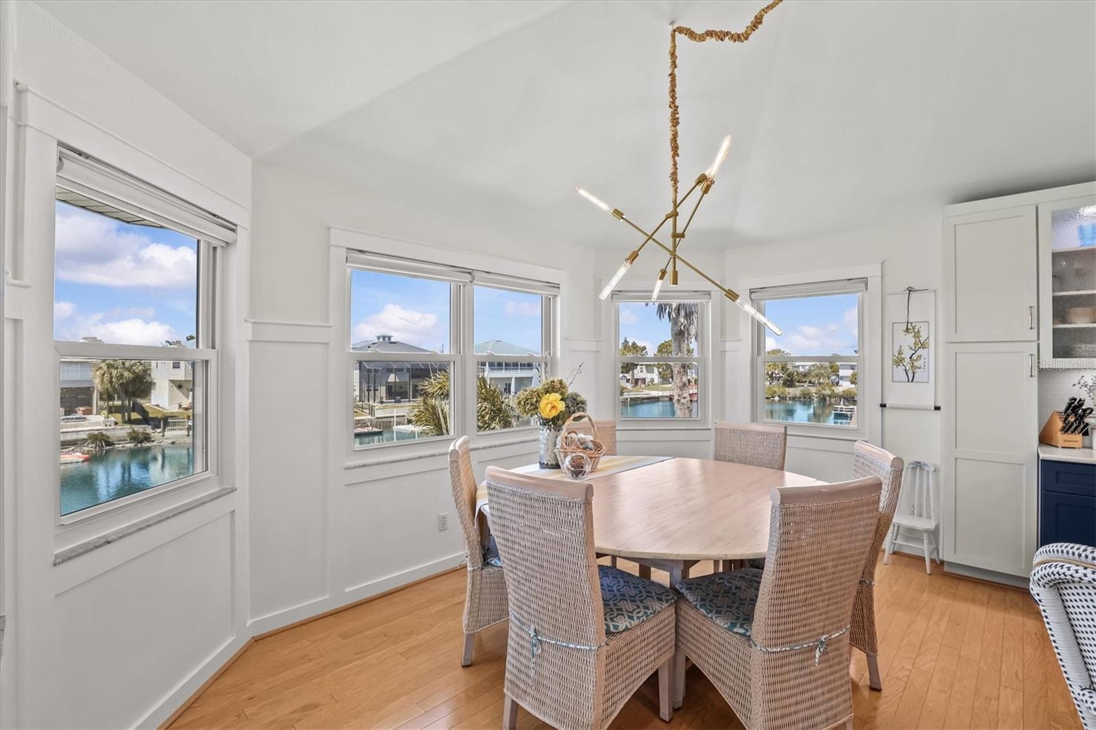 Dining Room with Bay Window Over Looking the Water
