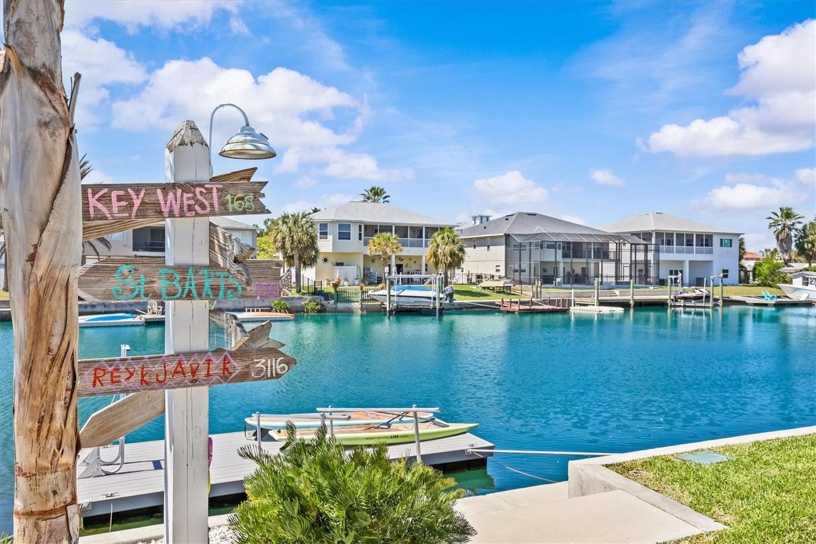 Wide Deep Canal with Newer Seawall & Floating Dock