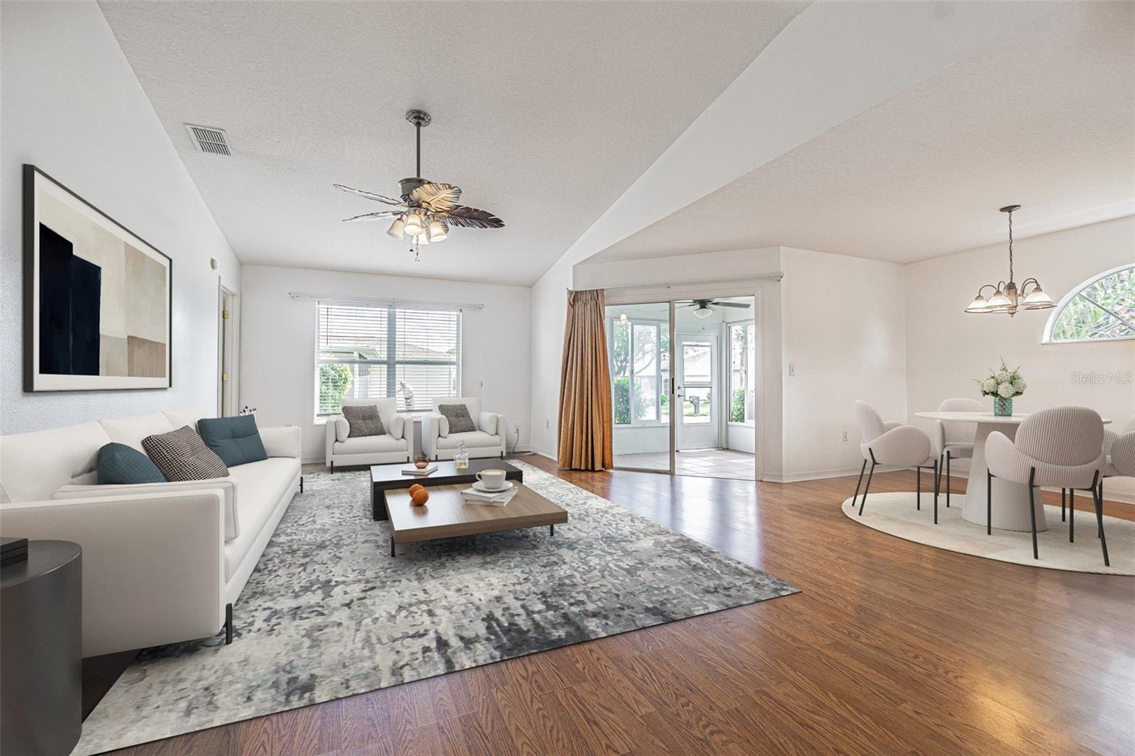 Cathedral ceiling and OPEN layout in this light, bright home!