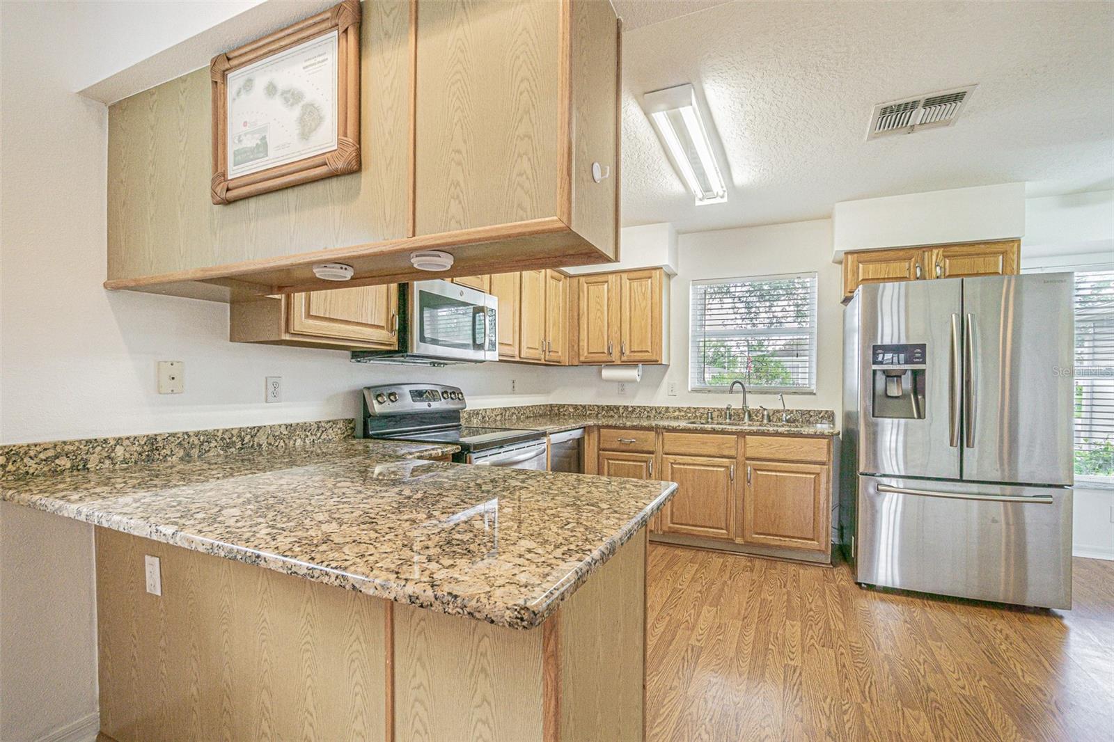 Breakfast bar in this functional kitchen!