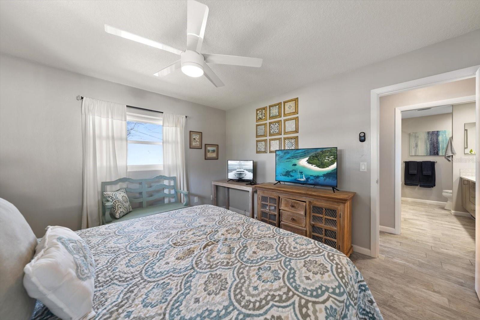 View from the nightstand to the front of Bedroom #2 and Bathroom