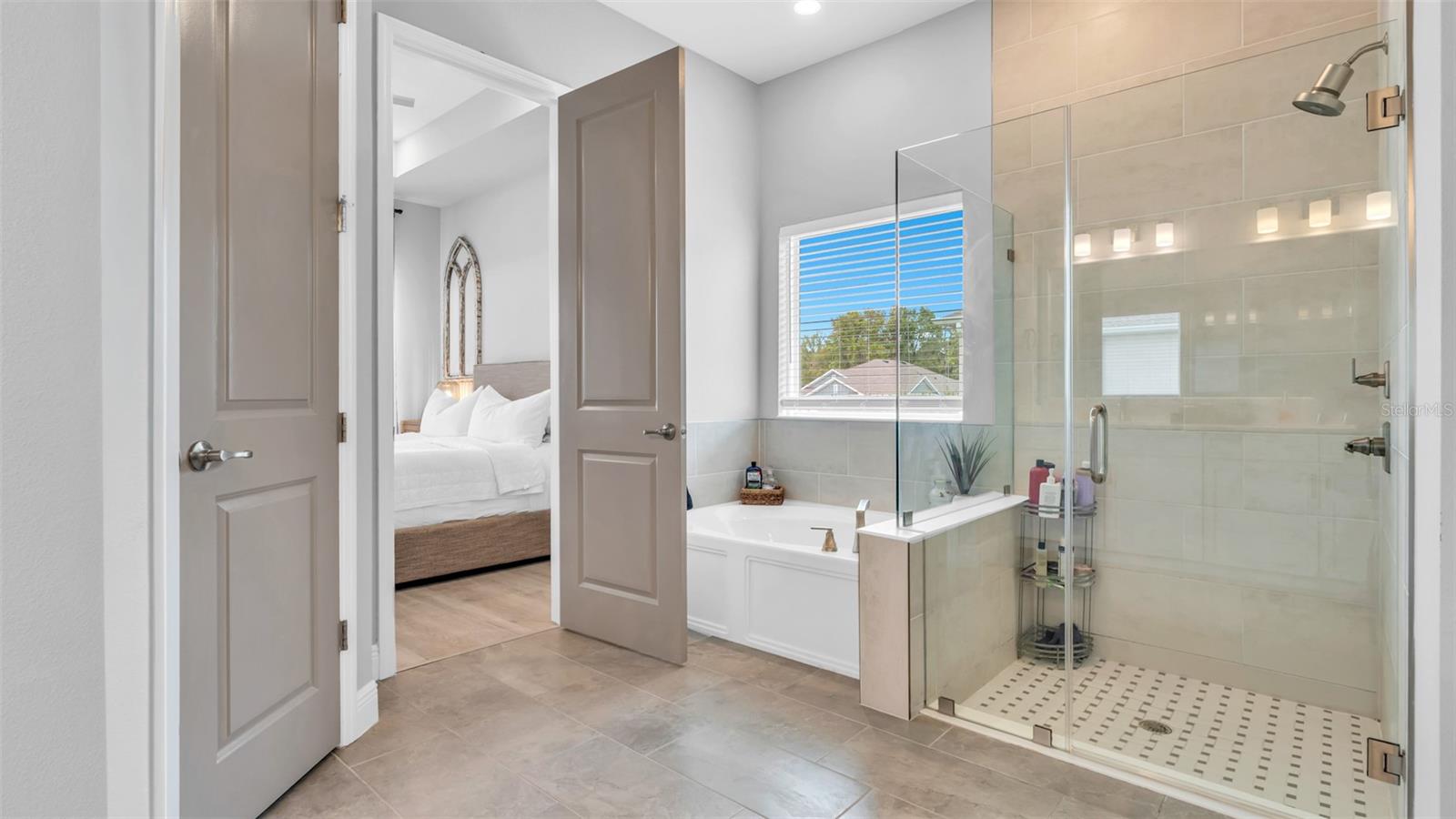 Master Bathroom with separate tub and shower.