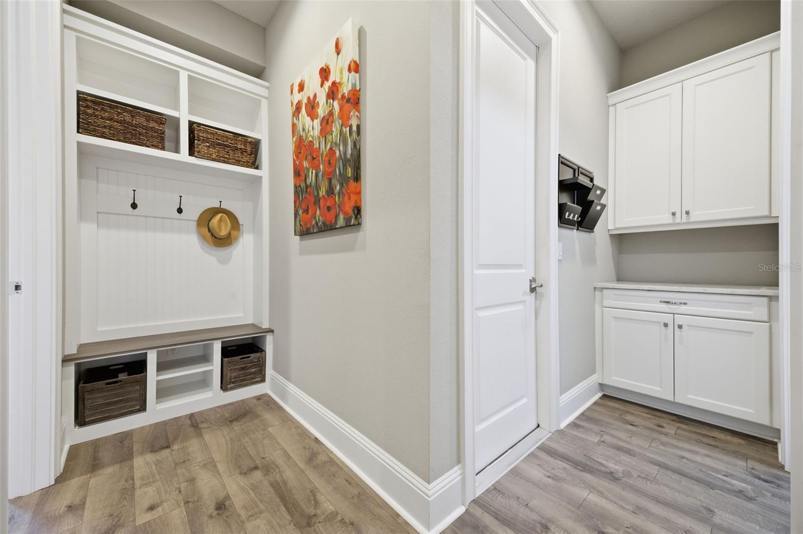 Landing to 3 Car Garage and Laundry