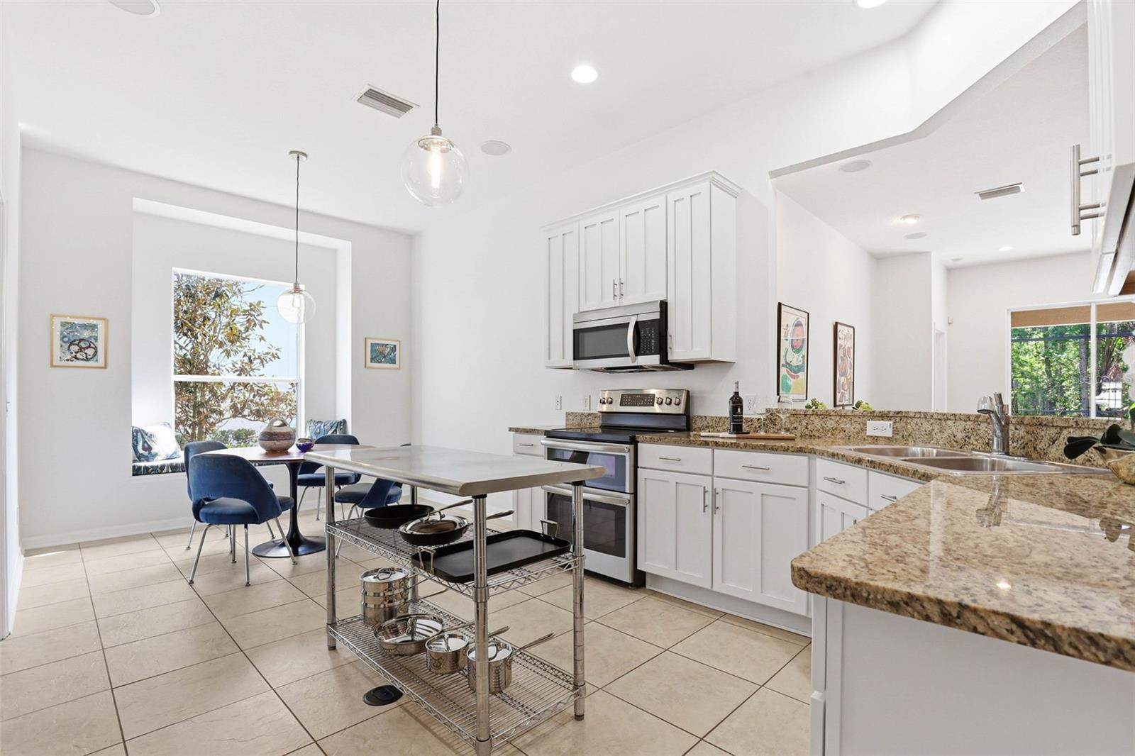 Kitchen: Granite Countertops & Solid Wood Cabinets