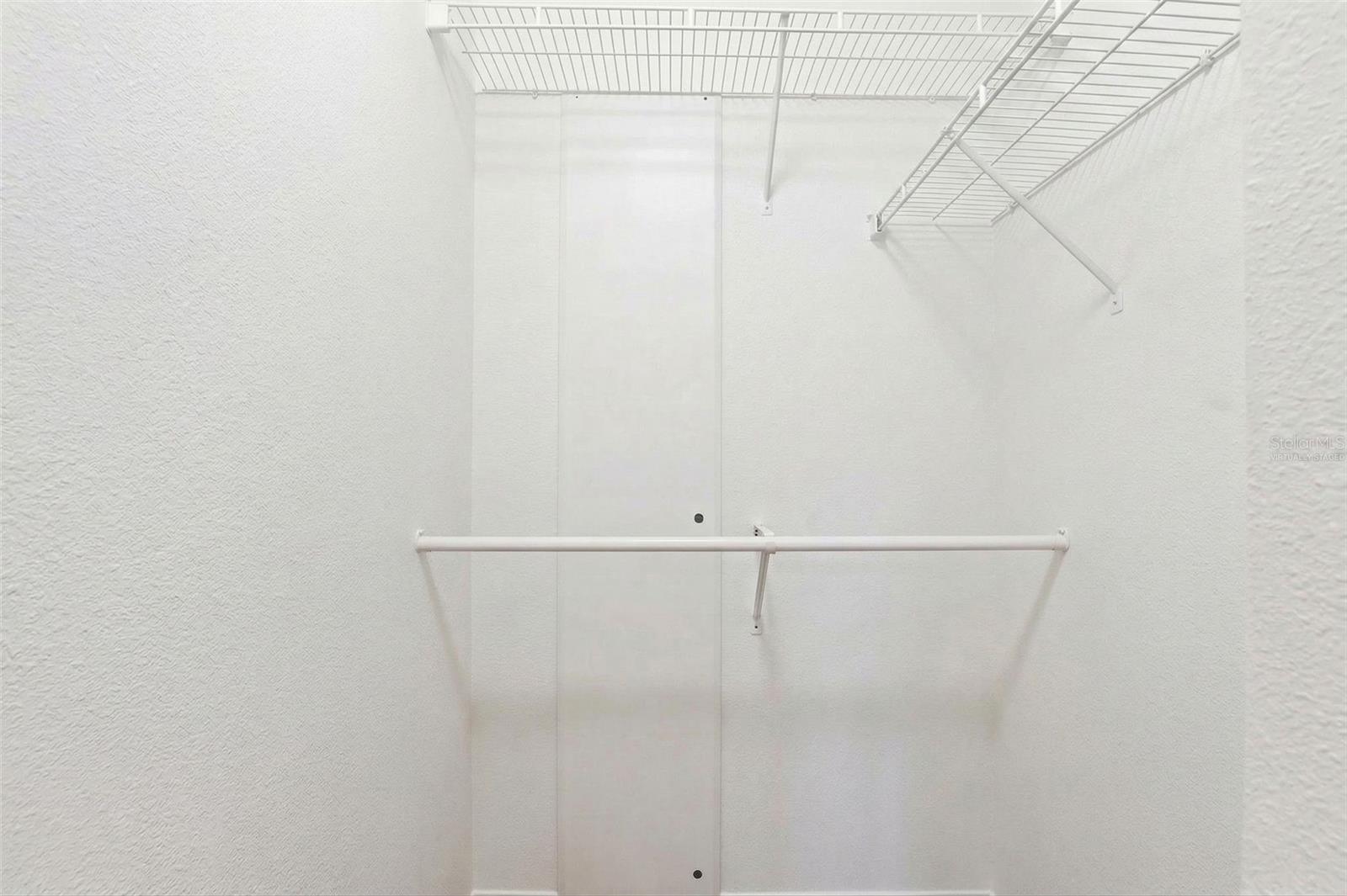 Virtually Staged: Expansive Walk-In Closet