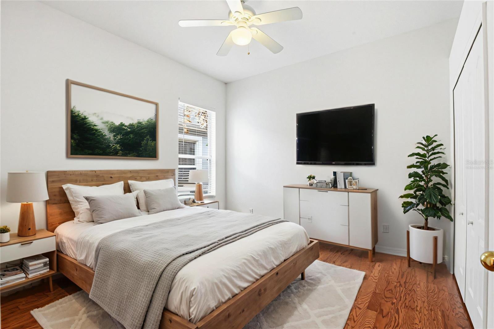 Virtually Staged Bedroom One:Wood Floors