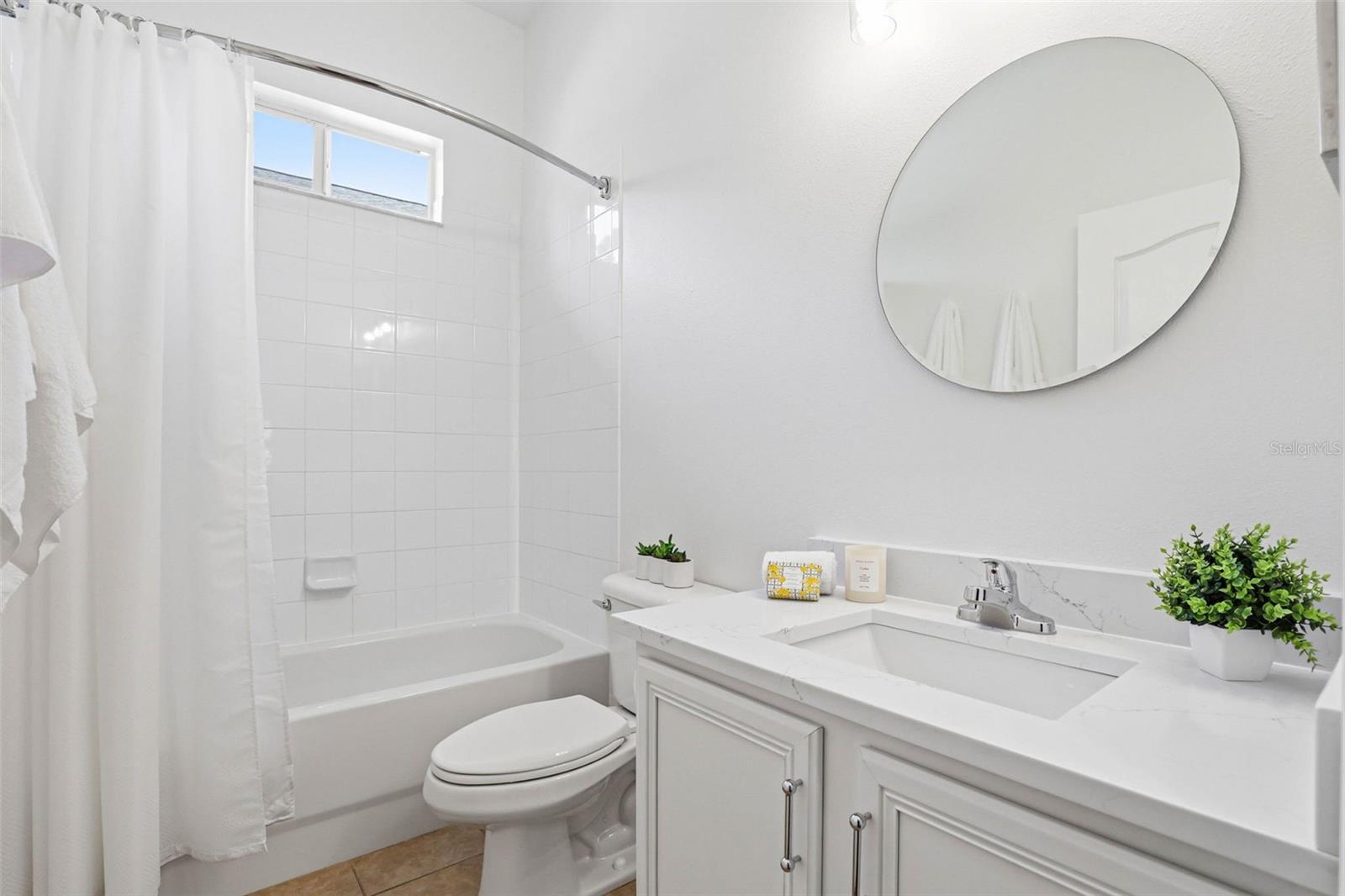 Second Full Bathroom: Quartz Counter Tops, Modern Fixtures