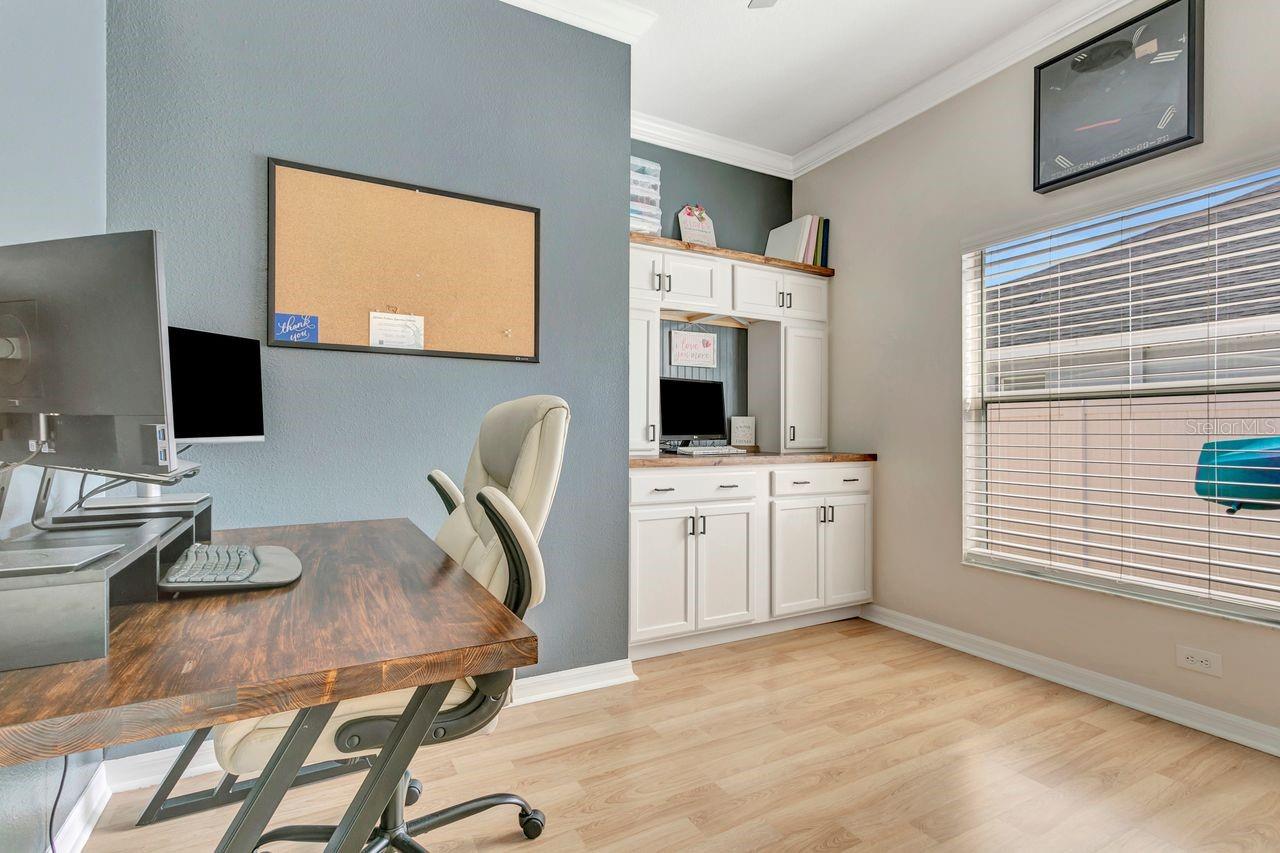 Den/Flex Space with custom French Door, Window, Custom Built-In Cabinetry, Ship Lap Accents and more.