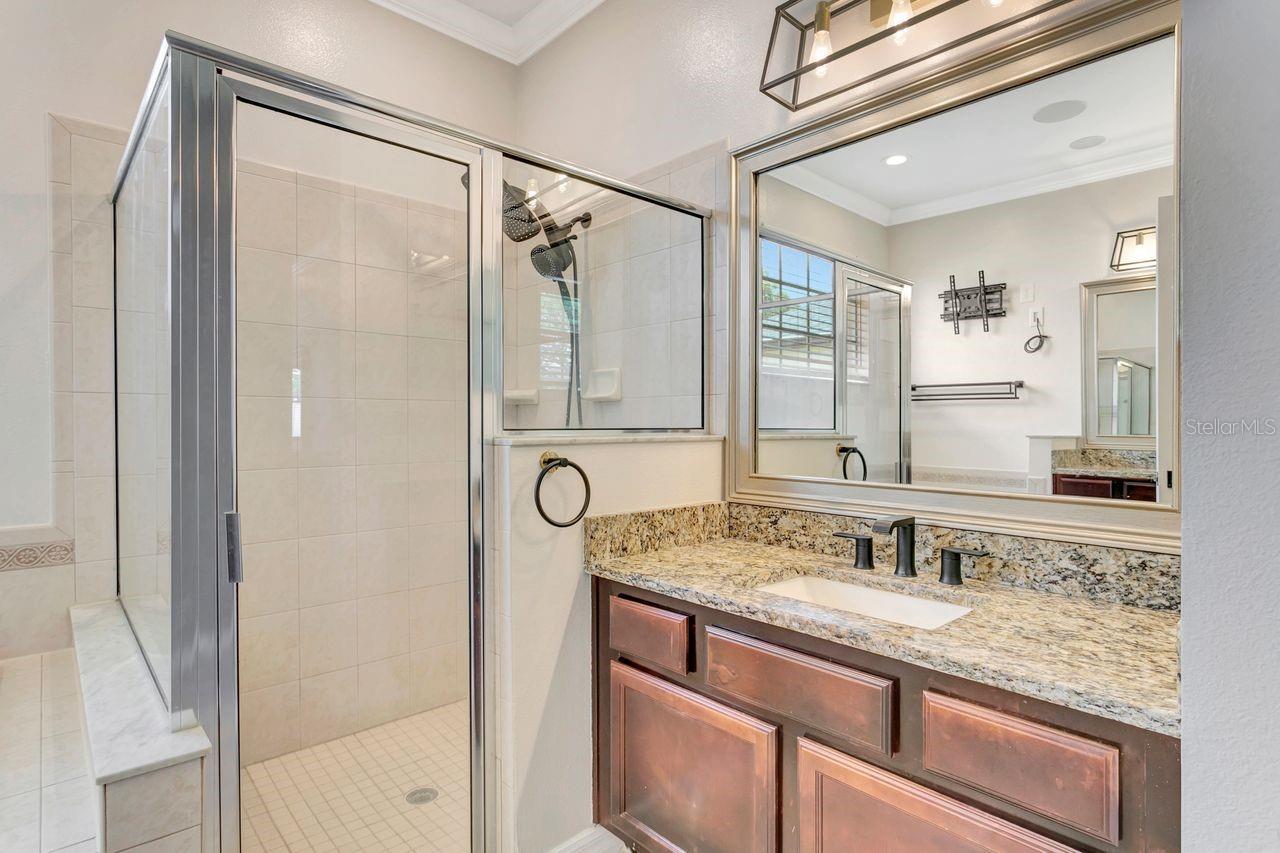 En-Suite Primary Bathroom with Granite Countertops
