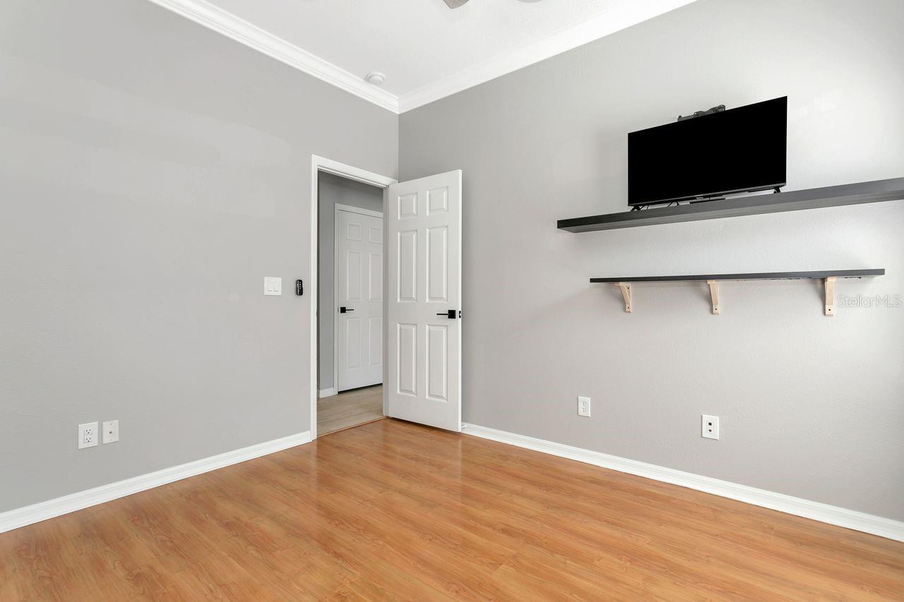 Bedroom #2 with LVP Floors, Ceiling Fan and Built-In Closet