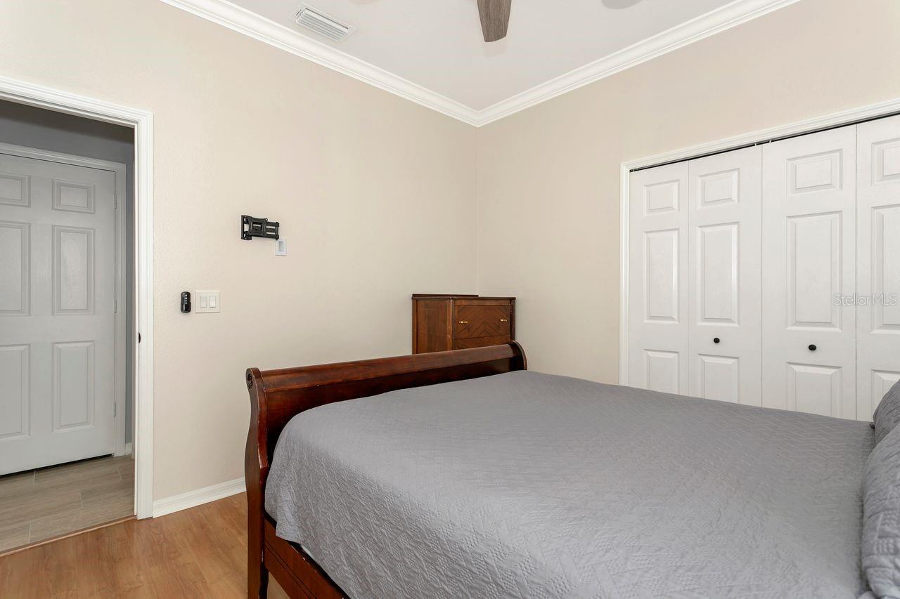 Bedroom #3 with LVP Floors, Ceiling Fan and Built-In Closet