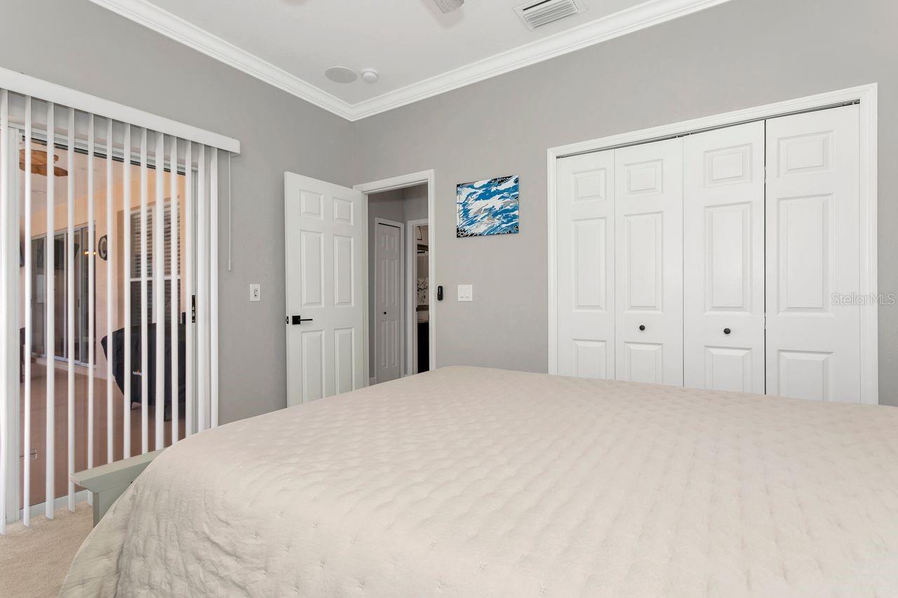 Bedroom 4 - with sliding glass doors and access to Pool and Pool Bathroom