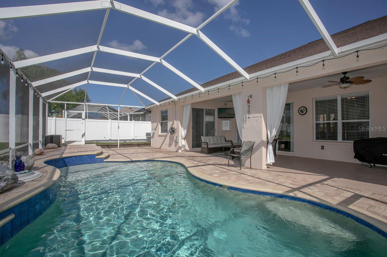 Heated Pool and Pool Cage with Pavered Deck