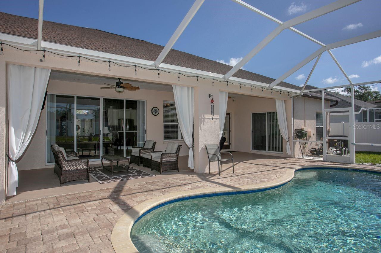 Heated Pool and Pool Cage with Pavered Deck