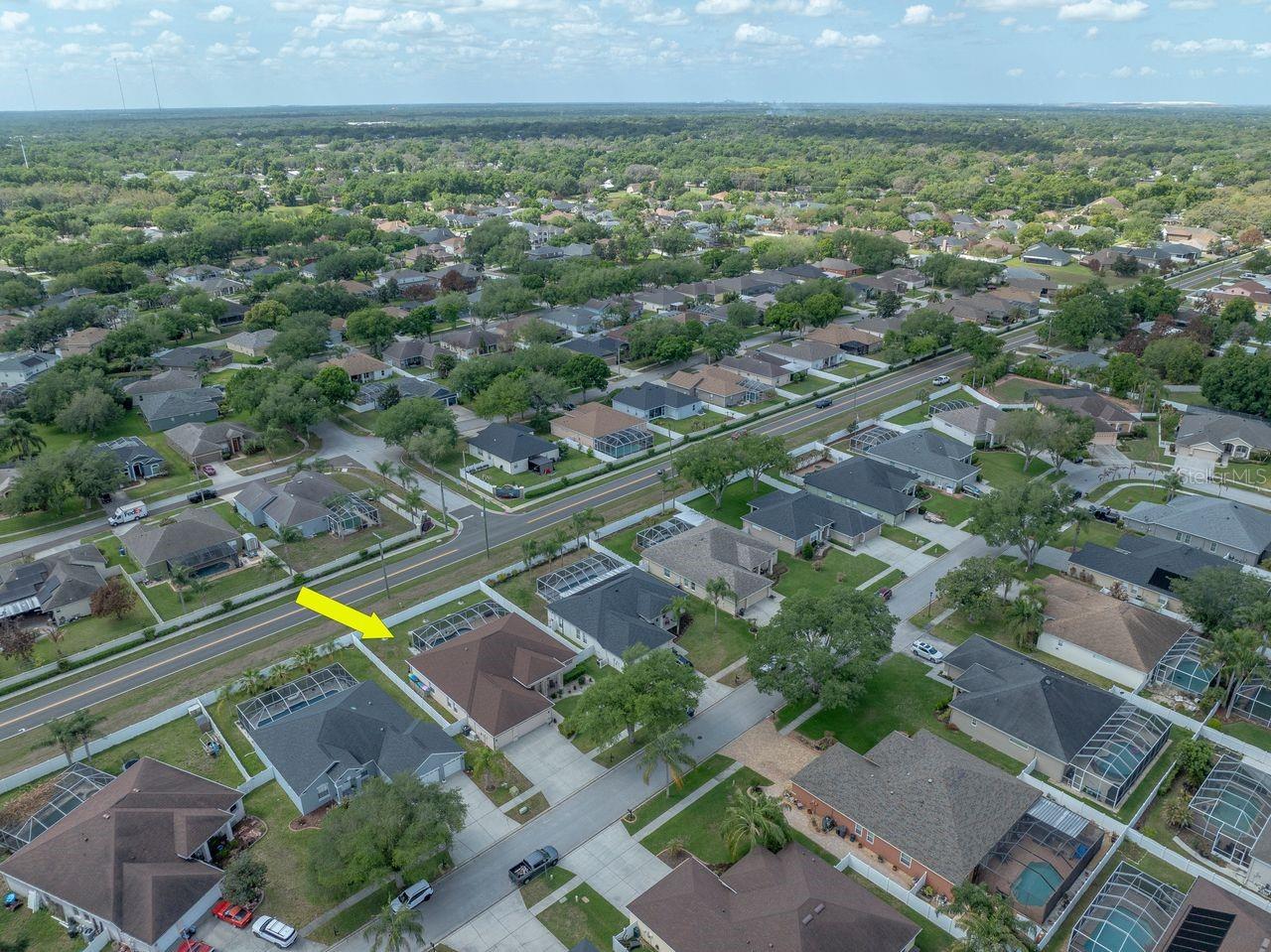 Aerial View of Home with Pool, Pool Cage, and Fully Fenced on a .25 Quarter Acre Lot