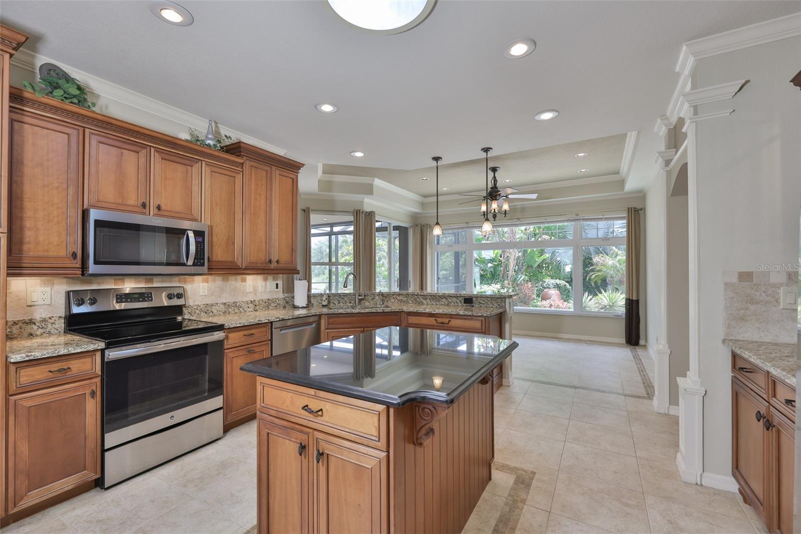 Detailed tile work, crown molding, ceiling details are all high end and carried through out the home.