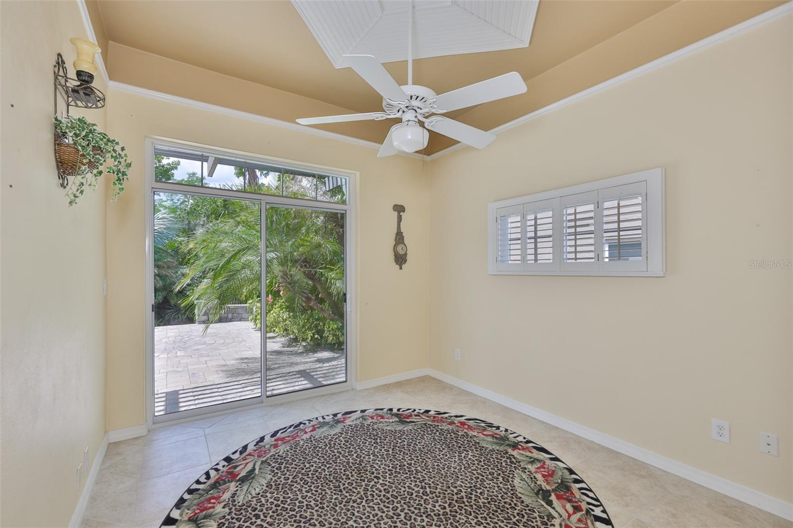 Plantation shutters finish off the room with a comfortable Floridian 'vibe'.