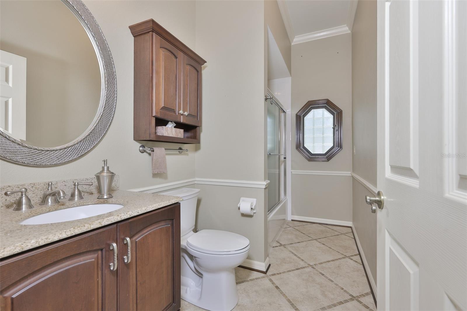 Guest bath is nicely finished and ready for your guests.  Since these room are on the opposite side of the house.  There is plenty of privacy for everyone.