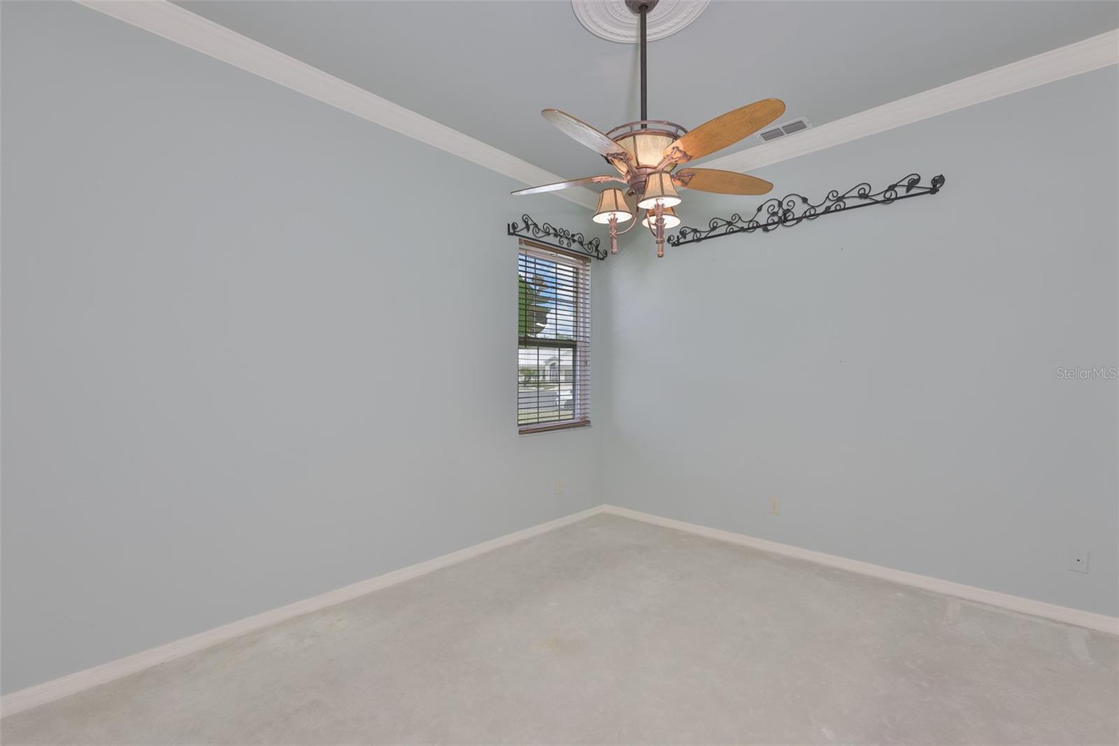 Bedroom #3 is comfortable and relaxing with a window for natural light.