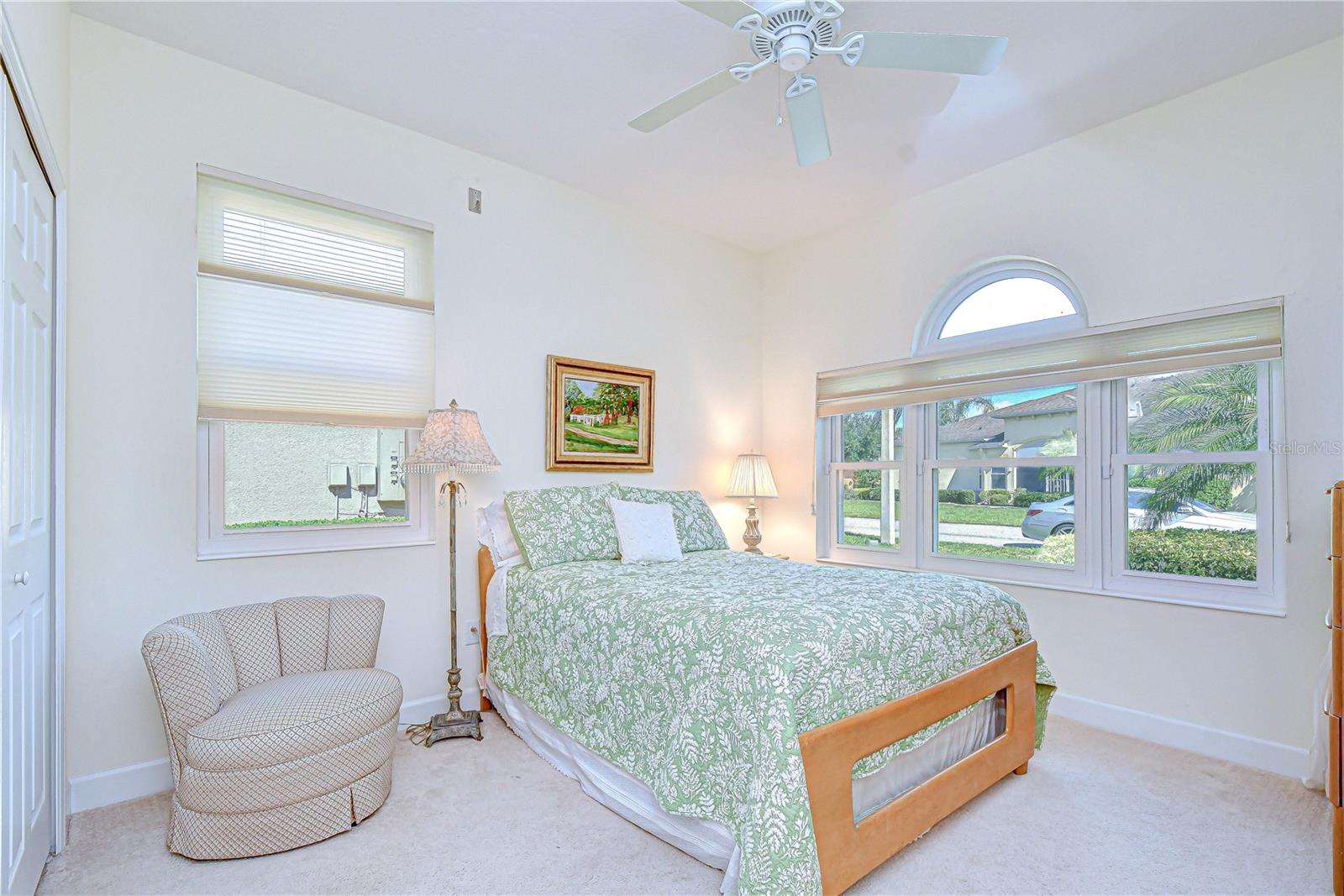 Comfortable guest bedroom at the front of the home.