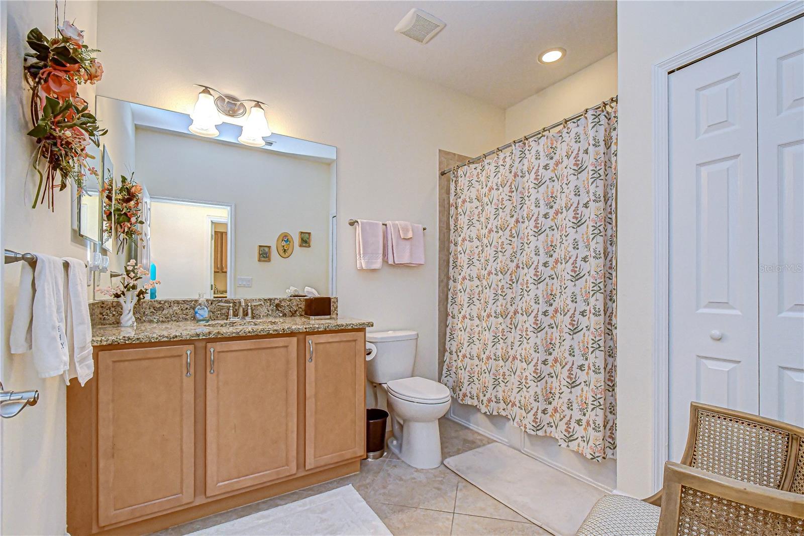 Full bath conveniently located for guests.