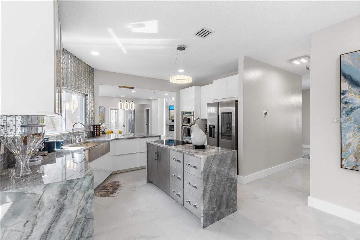 Essenza Quartzite waterfall counters & encapsulated island
